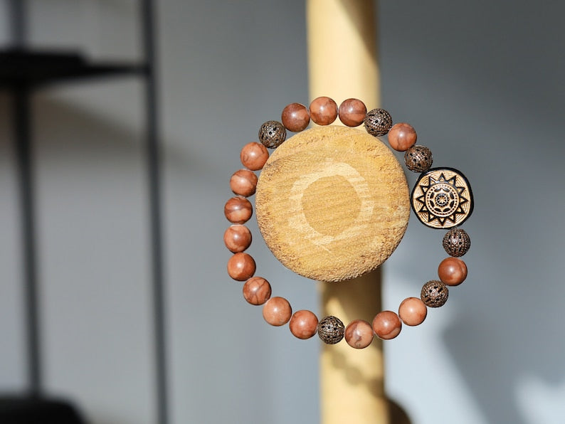 Tribal Totem Sun with Zebra Jaspers beads and Filigree in Bronze (dark Antique Copper) tone beads. to stimulate...