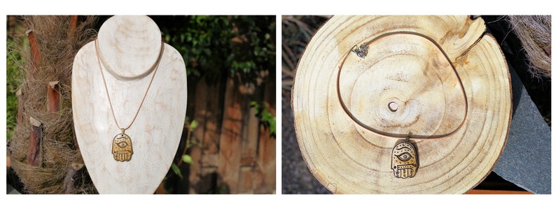 Hand Shaped Bone Pendant Amulets with Buddhas Eye from Nepal. The pendants measure 4.3 cm (kopie)