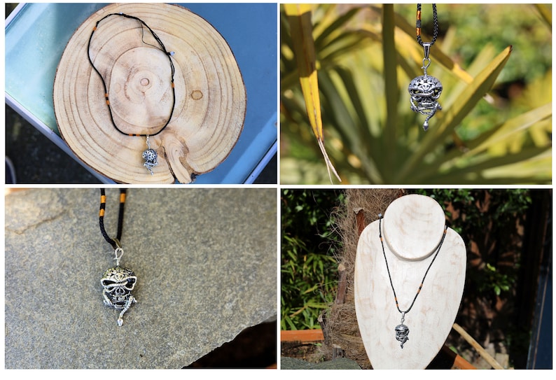 A beautiful large 3-D pendant: Skull with Snake. Metal in Antique Silver tone - Strong quality. All-over decoration, skull with pierced decoration,