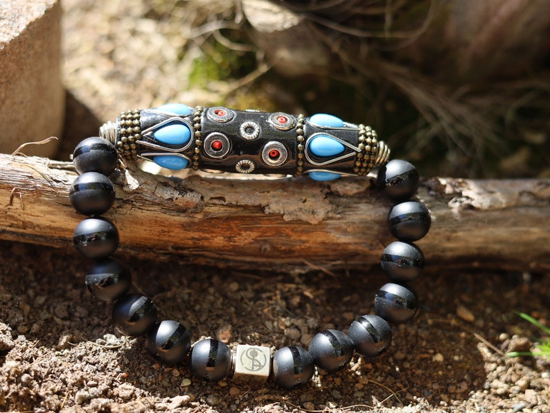 Amazing big Handmade Indonesia Bead combined 10 mm Black Agate beads. The artistry and a creativity of Indonesian beads is truly inspiring.