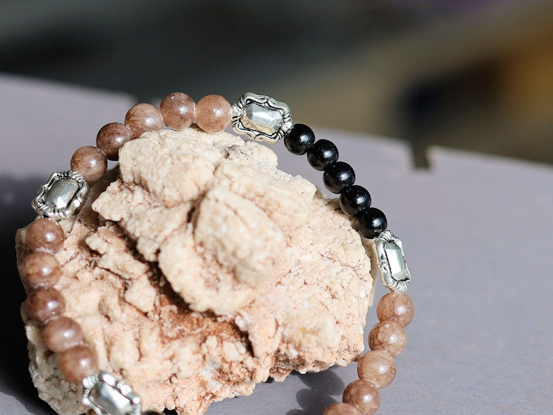 Crazy Horse Stone with black Agate and silver plated Tibetan spacer beads square. Elevate your style with our Unique Crazy Horse Stone Beaded Bracelet