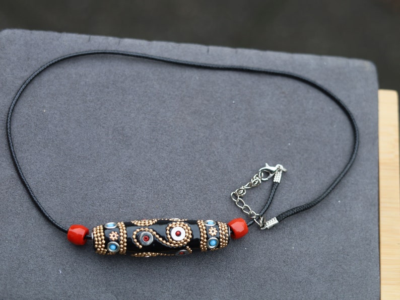 Oval Handmade Indonesia Bead necklace, with Platinum Metal Color Aluminum Cores. provide a modern and stylish element.