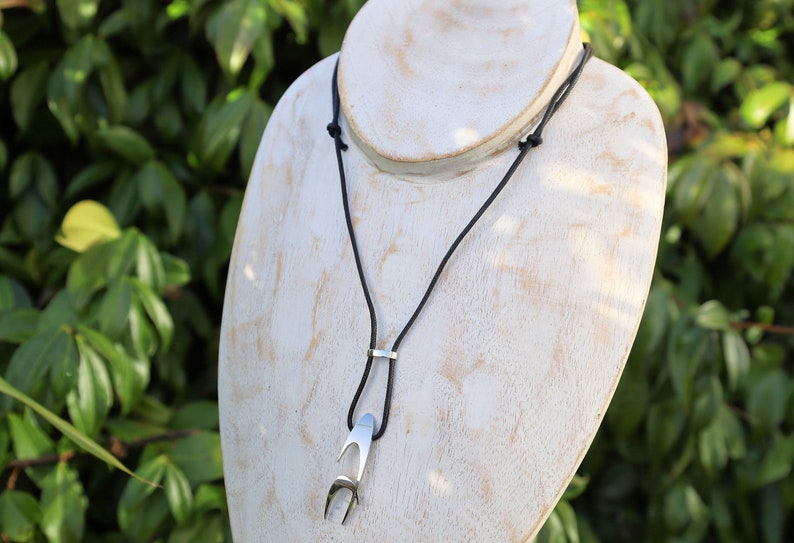 Chronotech Pendant with adjustable cord. Silver steel. size 6mmx 41mm. weight 8gr. Chronotech is an Italian brand of watches