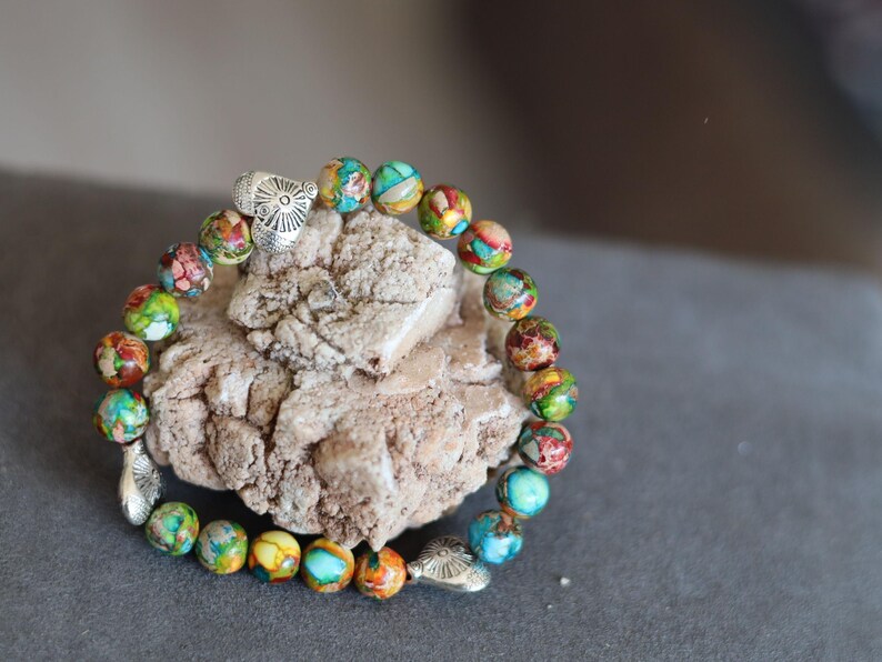 Colorful Sea Sediment Turquoise Bracelet – Tibetan Heart Design. Infuse your style with color, culture, and calm energy