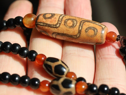 Great Nine-eye dZi bead necklace. It is called “The Star of Prosperity and the Heaven Protection”. Perfect for having good vibes with style!