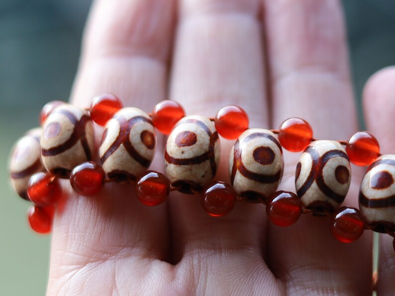 These Dzi beads are known as Love Stones. Channel energy into your life. Unique and stylish. DZI spiritual jewelry private collection!