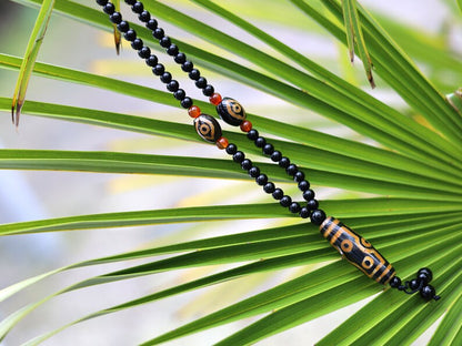 Amazing Seven Eye Dzi Beaded necklace. About a balanced life filled with blessings from the seven different aspirations in life.
