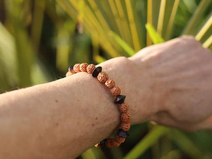 One of a kind Wajakaa bracelet! Round Rudraksha beads - made from the seeds of the Elaeocarpus Ganitrus tree. Combined +Patikan Palmwood