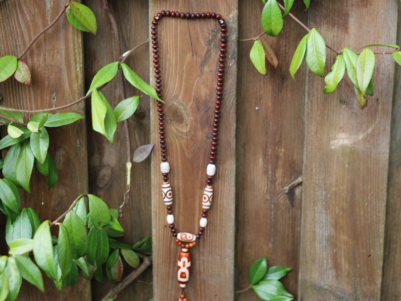 Big unique Wealth God Figure Dzi Bead bracelet combined with 4 eyes beads and Design. Perfect for having good vibes with style!