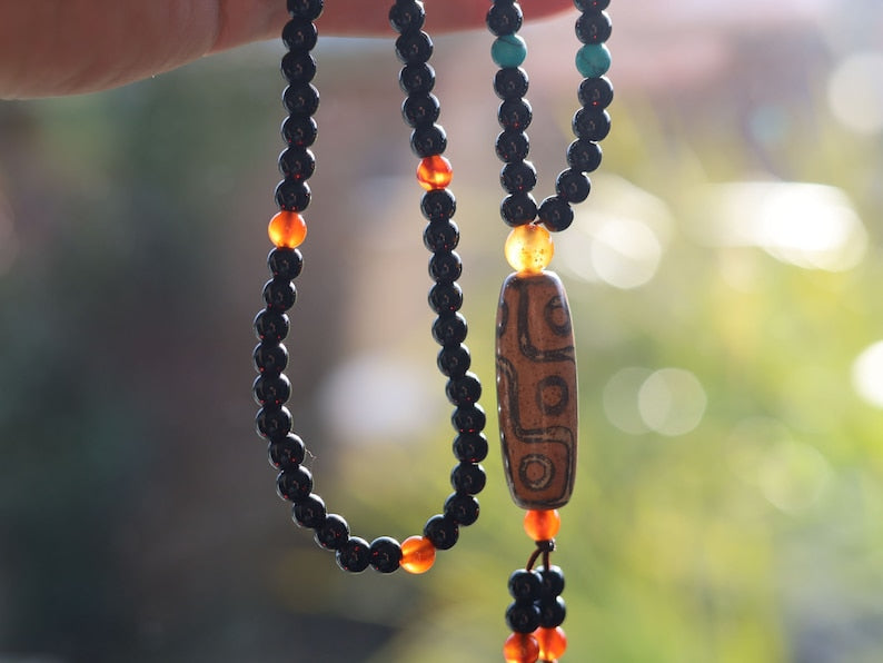Great Nine-eye dZi bead necklace. It is called “The Star of Prosperity and the Heaven Protection”. Perfect for having good vibes with style!