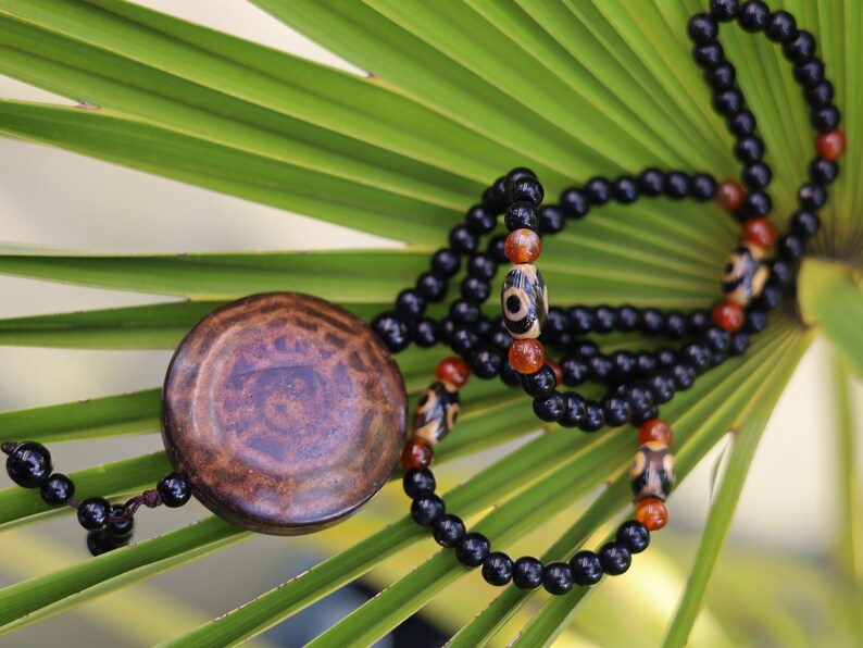Magic Power Mystical Symbol Yin Yang Pendant Necklace, a visual representation of the dynamic and harmonious nature of existence