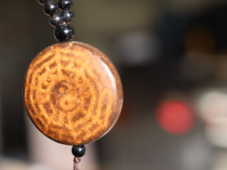 Magic Power Mystical Symbol Yin Yang Pendant Necklace, a visual representation of the dynamic and harmonious nature of existence