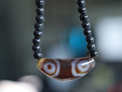 Uncommon Dzi Bead 6 eyes necklace. Helps those who seek self-knowledge, self-cultivation and spiritual practices.