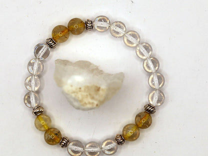 Gahiṇā Jewel Collection - Divine Bracelet with Gold Rutile and Rockcrystal beads. Top quality  with Tribal Silver Plated Spacer Beads.
