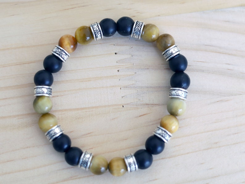 Gahiṇā Jewel Collection - Cool Bracelet with real Shungite and Gold Tiger Eye. Tribal Silver Plated Spacer Beads. Mindfully made