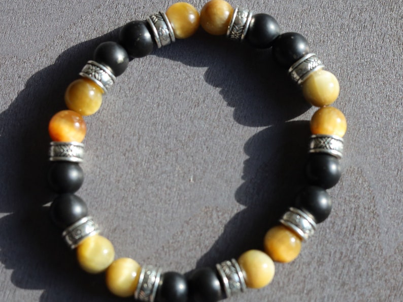 Gahiṇā Jewel Collection - Cool Bracelet with real Shungite and Gold Tiger Eye. Tribal Silver Plated Spacer Beads. Mindfully made