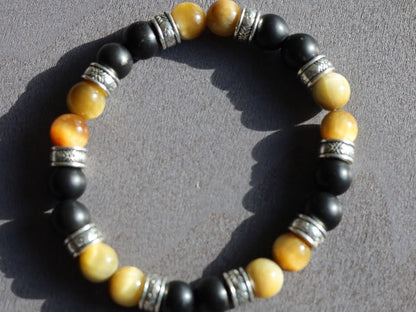 Gahiṇā Jewel Collection - Cool Bracelet with real Shungite and Gold Tiger Eye. Tribal Silver Plated Spacer Beads. Mindfully made