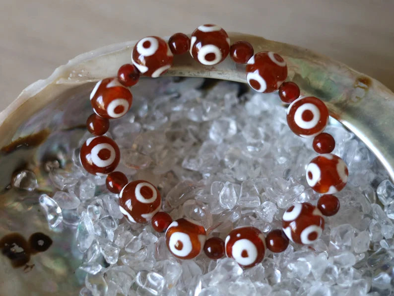 Unique Natural Stone Bracelet/Tibetan Dzi 3 Eyes Bead Charm Bracelets. Tibetan Buddhist jewelry have both religious and spiritual essence