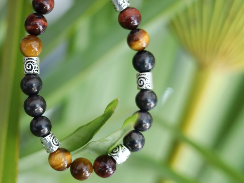 100% Shungite beads with Tri-Color Tiger Eye beads and Tribal Silver Plated Spacer Beads. Amulets for protection, worship, health and wealth