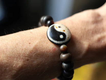 Tibetan bracelet in black and white dzi pearl. Dare to standout, dare to be different with a unique style.
