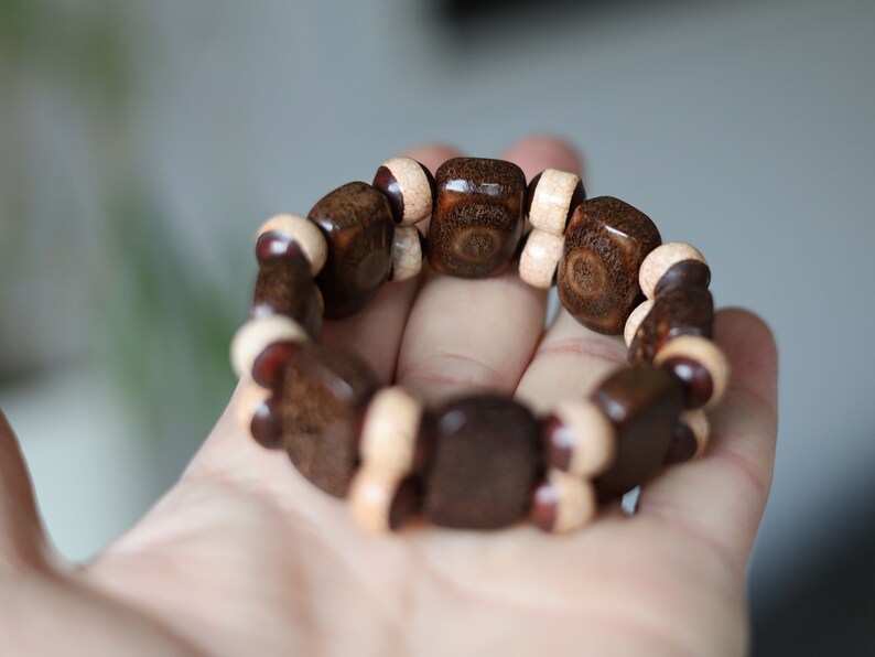 Bracelet of Agate/Carnelian feels silky soft, size of the bead 15x25mm, with separate Tibetan symbols. Unique Tibetan Bracelets