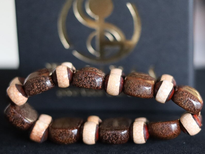 Bracelet of Agate/Carnelian feels silky soft, size of the bead 15x25mm, with separate Tibetan symbols. Unique Tibetan Bracelets