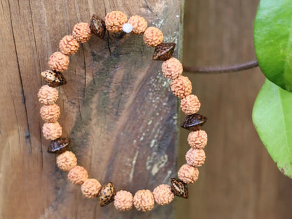 One of a kind Wajakaa bracelet! Round Rudraksha beads - made from the seeds of the Elaeocarpus Ganitrus tree. Combined +Patikan Palmwood