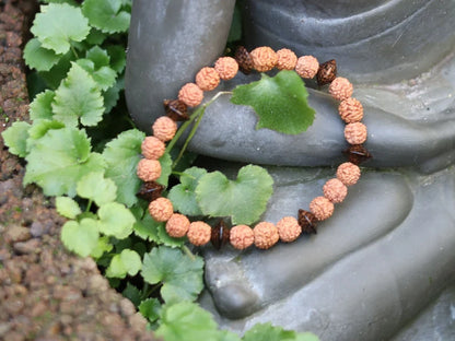 One of a kind Wajakaa bracelet! Round Rudraksha beads - made from the seeds of the Elaeocarpus Ganitrus tree. Combined +Patikan Palmwood