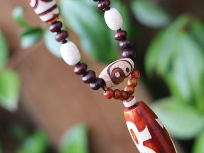 Big unique Wealth God Figure Dzi Bead bracelet combined with 4 eyes beads and Design. Perfect for having good vibes with style!
