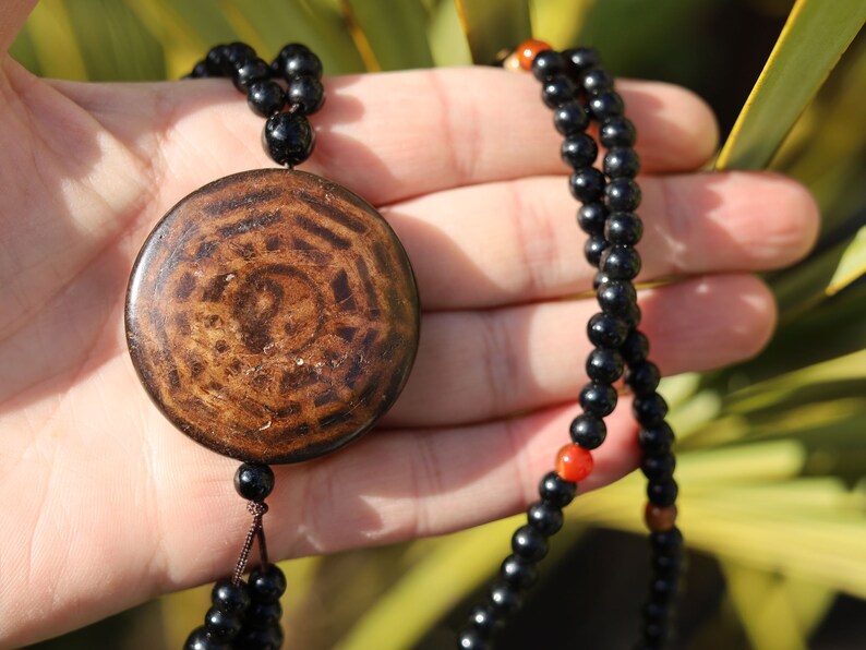 Magic Power Mystical Symbol Yin Yang Pendant Necklace, a visual representation of the dynamic and harmonious nature of existence