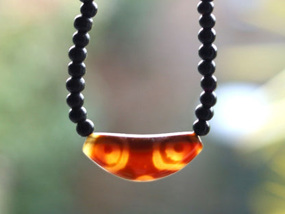 Uncommon Dzi Bead 6 eyes necklace. Helps those who seek self-knowledge, self-cultivation and spiritual practices.
