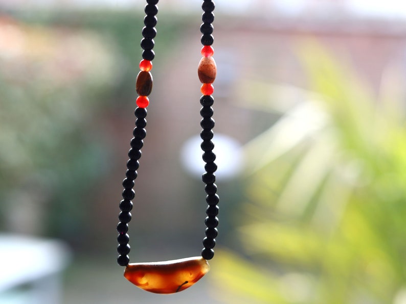 Uncommon Dzi Bead 6 eyes necklace. Helps those who seek self-knowledge, self-cultivation and spiritual practices.