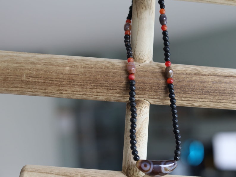 Uncommon Dzi Bead 6 eyes necklace. Helps those who seek self-knowledge, self-cultivation and spiritual practices.