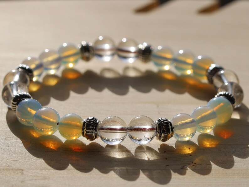 Gahiṇā Jewel Collection - Charming Bracelet with Opalite with Rockcrystal with Tribal Silver Plated Spacer Beads. Mindfully made