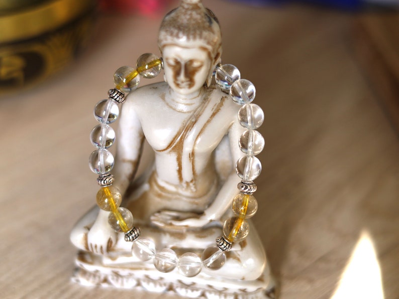 Gahiṇā Jewel Collection - Divine Bracelet with Gold Rutile and Rockcrystal beads. Top quality  with Tribal Silver Plated Spacer Beads.