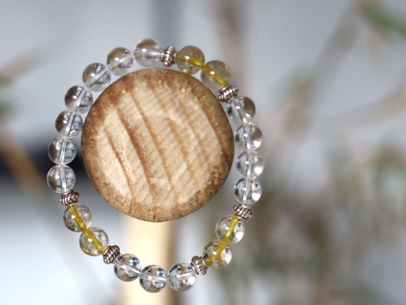 Gahiṇā Jewel Collection - Divine Bracelet with Gold Rutile and Rockcrystal beads. Top quality  with Tribal Silver Plated Spacer Beads.