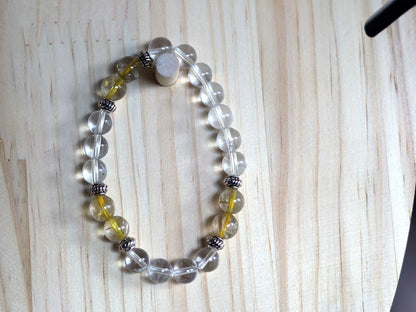 Gahiṇā Jewel Collection - Divine Bracelet with Gold Rutile and Rockcrystal beads. Top quality  with Tribal Silver Plated Spacer Beads.