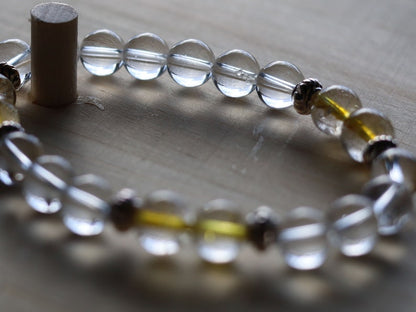 Gahiṇā Jewel Collection - Divine Bracelet with Gold Rutile and Rockcrystal beads. Top quality  with Tribal Silver Plated Spacer Beads.