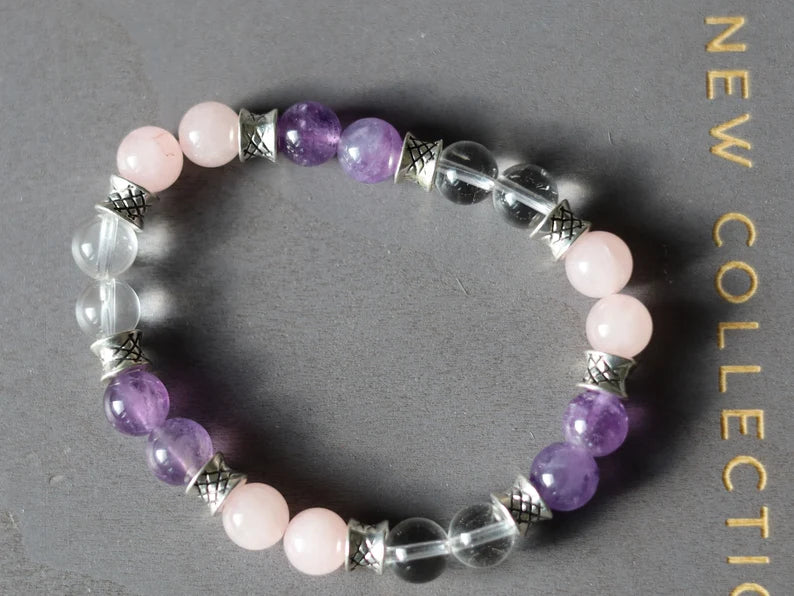 Gahiṇā Jewel Collection - Gold Triangle Bracelets with Rock Crystal, Rose Quartz and Amethyst. Tribal Silver Plated Spacer Beads.
