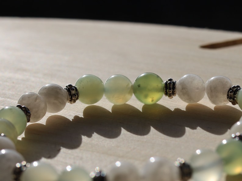 Gahiṇā Jewel Collection - Unique Bracelet with beautiful Xiu Jade and & Indian Moonstone. Tribal Silver Plated Spacer Beads.