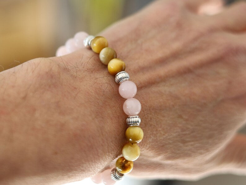 Gahiṇā Jewel Collection - Surprising Bracelet with Gold Tiger Eye and Rose quartz. Tribal Silver Plated Spacer Beads. Meaningful
