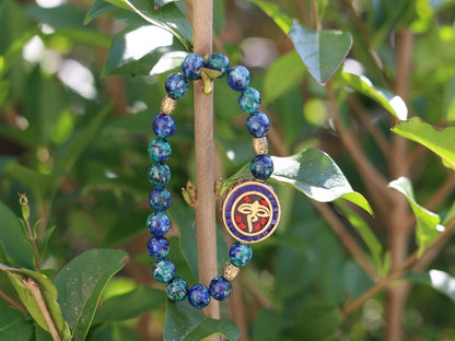 Viśēśa Jewel Collection - Miraculous Buddha eyes Blue Jade  bracelet. These eyes look in four directions to symbolize his wisdom.
