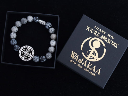 Viśēśa Jewel Collection - Awesome Buddhist Jewelry bracelet. Bracelet made with  different beads. Snowflake Obisidan and Silver Leaf Jasper.