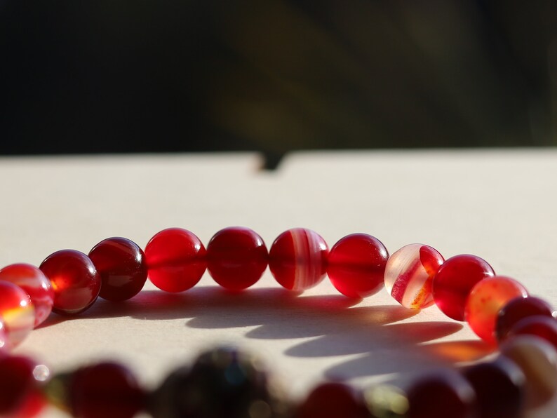 Viśēśa Jewel Collection - Unique cool Dark red agate beautiful grade.  Connects to guardian angels above and Mother Earth below