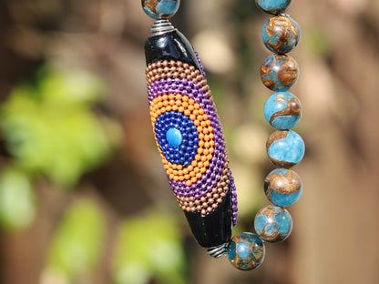 Vaḍā Bīḍa collection - Great 10 mm Aqua Aura Quartz bracelet and big Handmade Indonesia Bead. Powerbeads to enhance the spiritual well-being