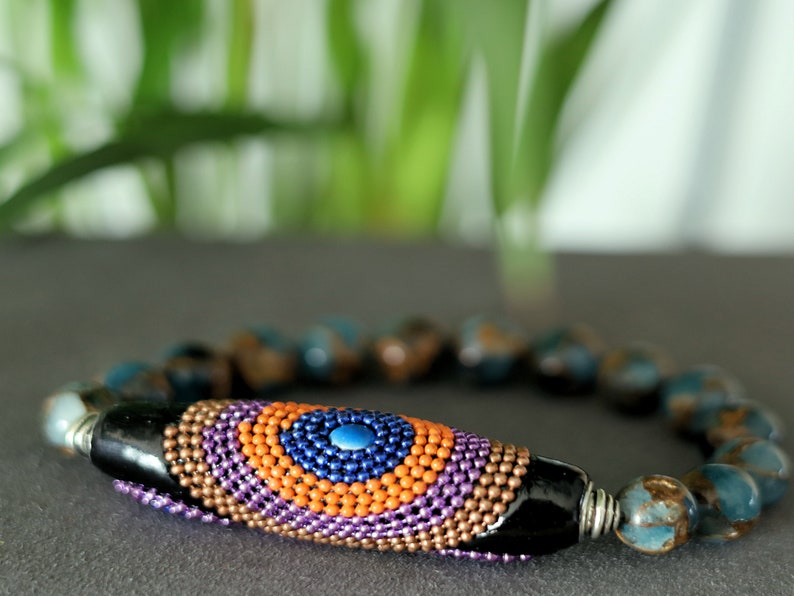 Vaḍā Bīḍa collection - Great 10 mm Aqua Aura Quartz bracelet and big Handmade Indonesia Bead. Powerbeads to enhance the spiritual well-being