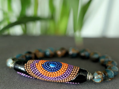 Vaḍā Bīḍa collection - Great 10 mm Aqua Aura Quartz bracelet and big Handmade Indonesia Bead. Powerbeads to enhance the spiritual well-being