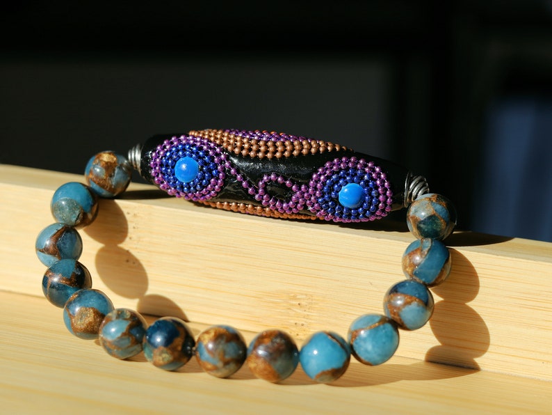 Vaḍā Bīḍa collection - Great 10 mm Aqua Aura Quartz bracelet and big Handmade Indonesia Bead. Powerbeads to enhance the spiritual well-being