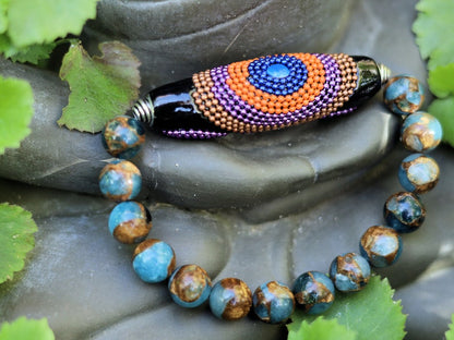 Vaḍā Bīḍa collection - Great 10 mm Aqua Aura Quartz bracelet and big Handmade Indonesia Bead. Powerbeads to enhance the spiritual well-being