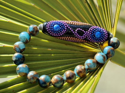 Vaḍā Bīḍa collection - Great 10 mm Aqua Aura Quartz bracelet and big Handmade Indonesia Bead. Powerbeads to enhance the spiritual well-being